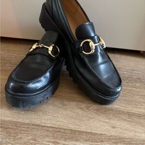 Elegant Black Loafers with Gold Accent